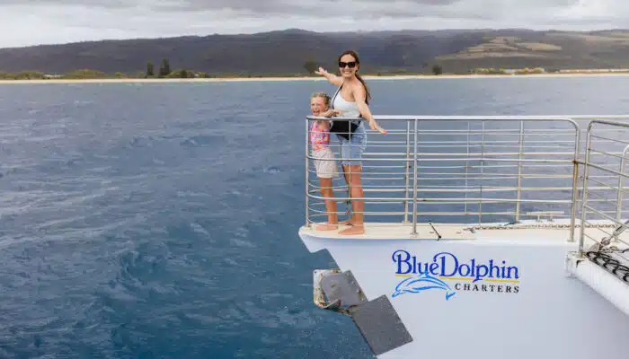 People on bow of boat | Blue Dolphin Kauai